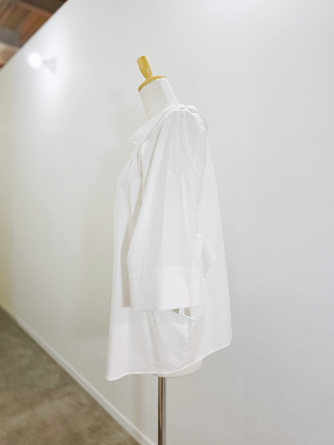 ENFOLD HIGH-NECK BLOUSE