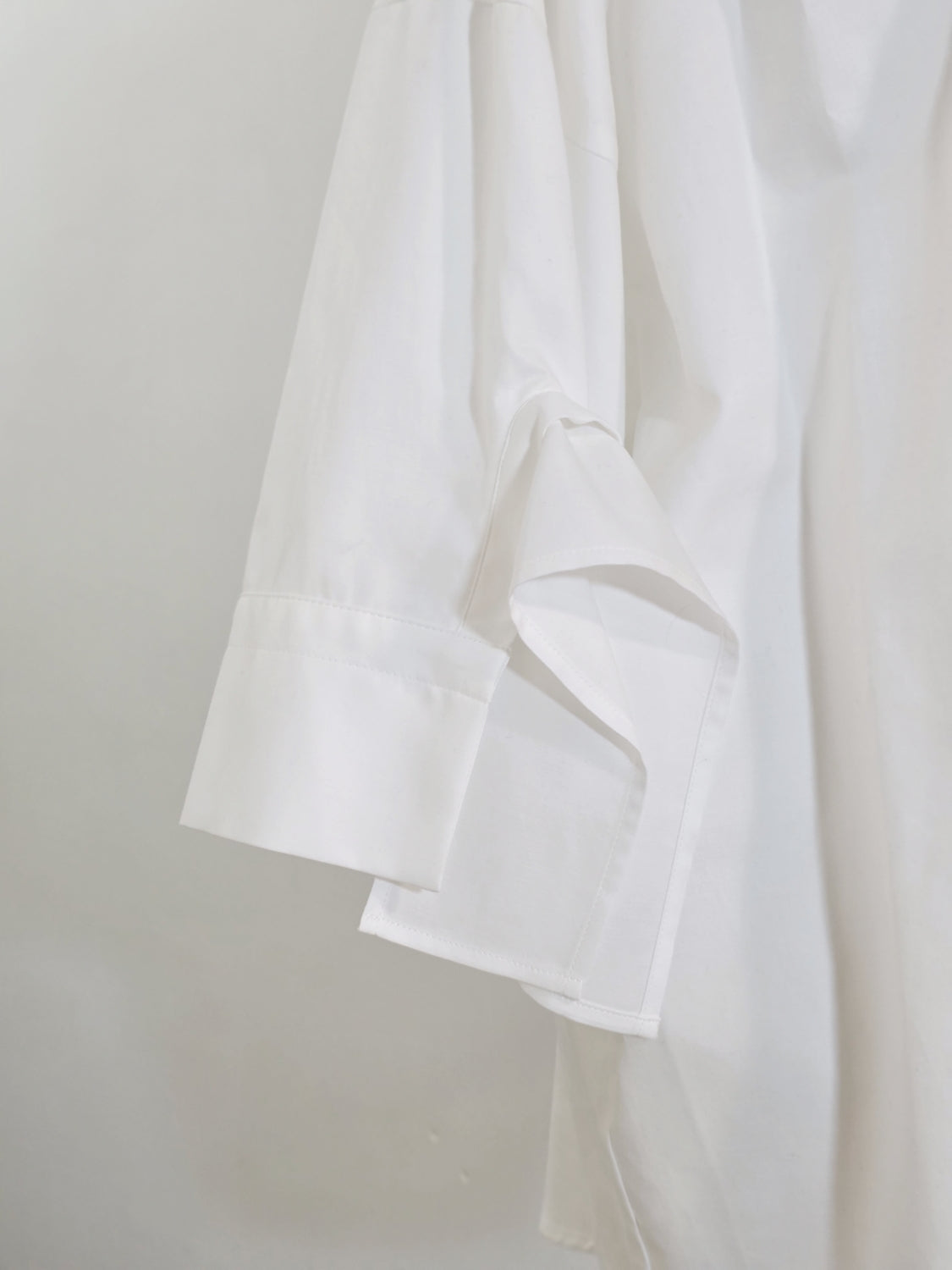 ENFOLD HIGH-NECK BLOUSE