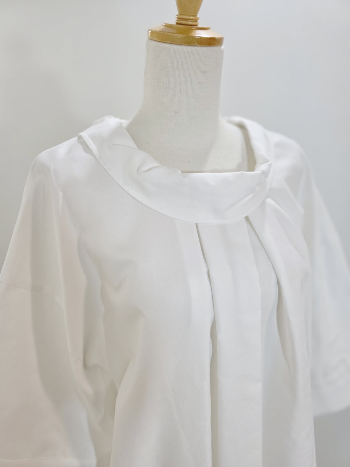 ENFOLD  HIGH-NECK BLOUSE