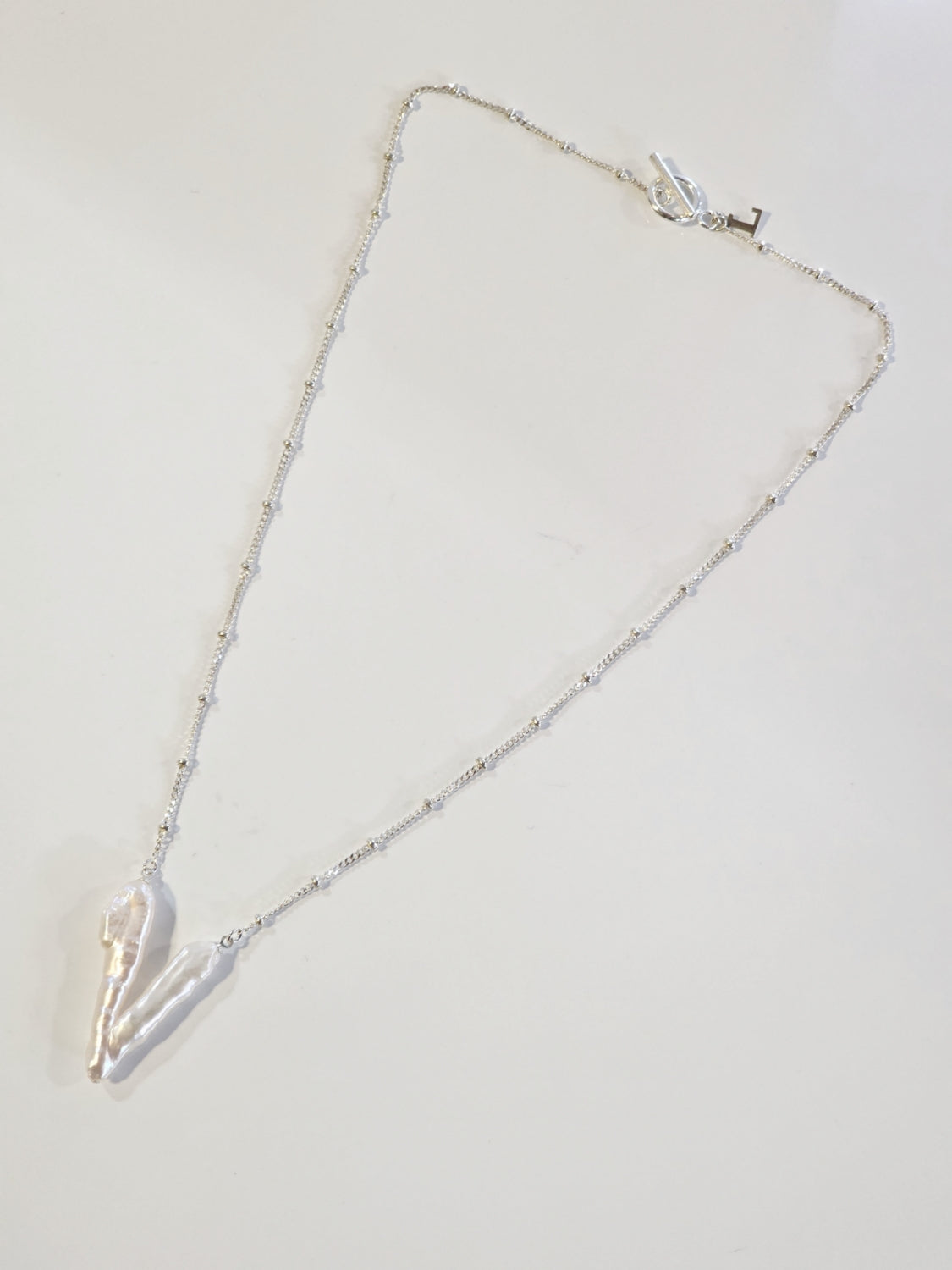 Lemme.  Anubis Pearl Necklace