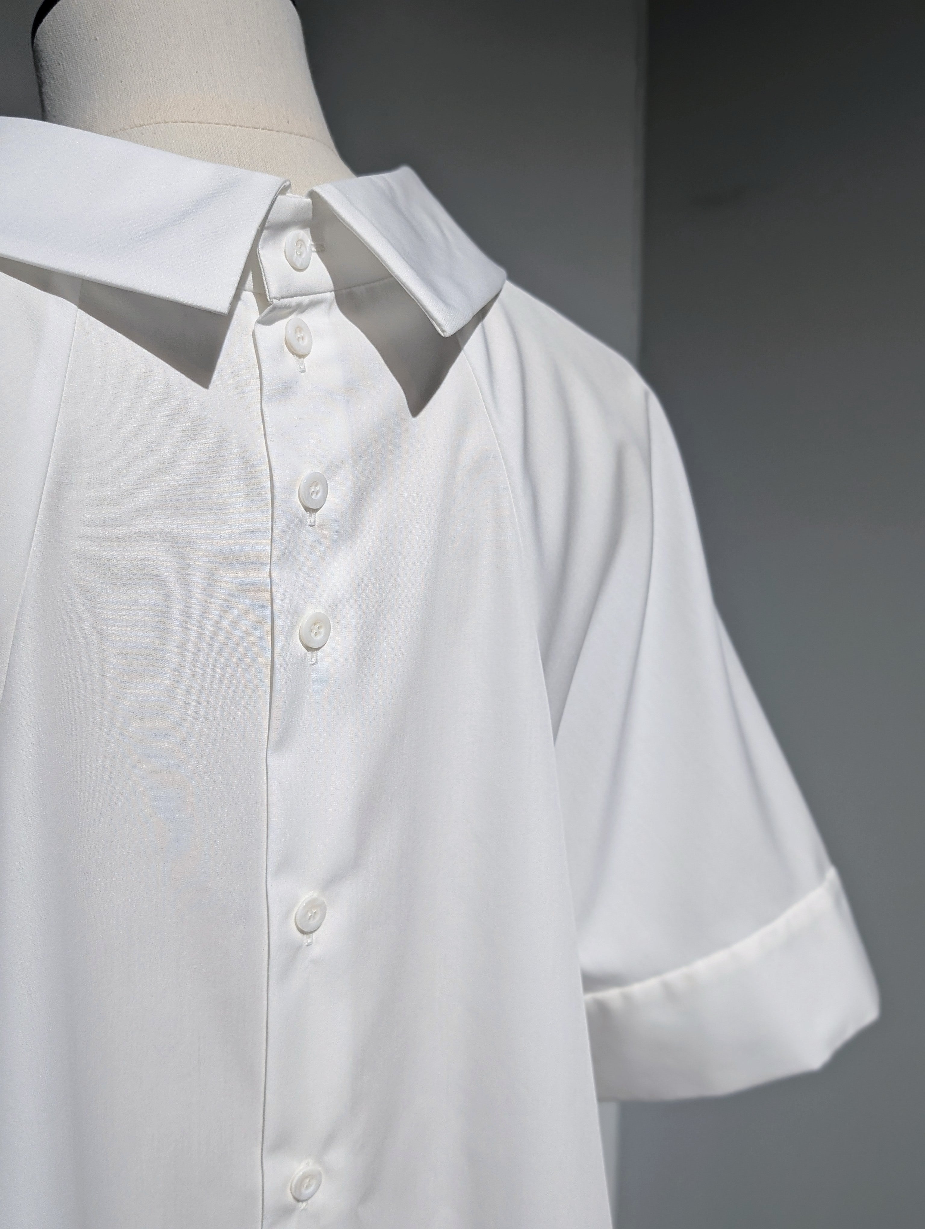 ENFOLD  HIGH-NECK BLOUSE
